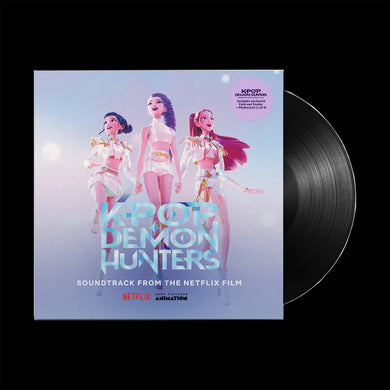 Vinyl record with 'KPOP Demon Hunters' soundtrack cover featuring characters on a light blue background.
